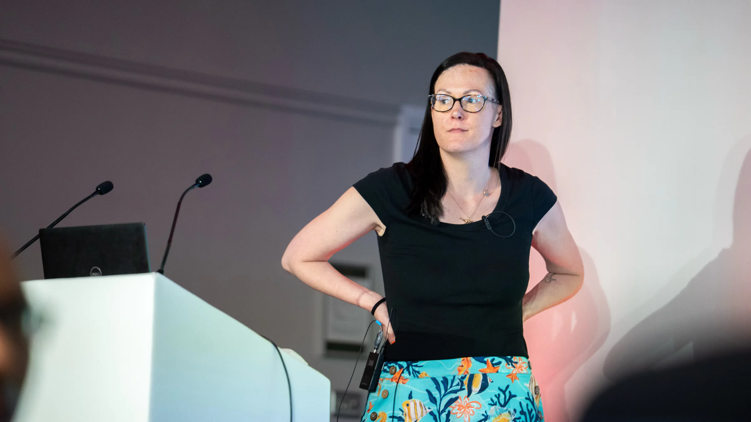 Clare E Kenny speaking at a lectern