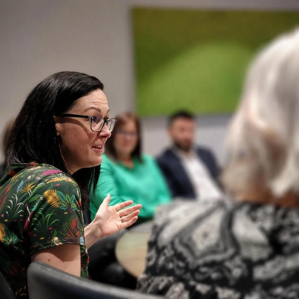 Workplace consultant Clare E Kenny in discussion with senior leaders